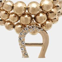 Pre Owned Aigner Bedazzled Gold Plated Crystal Logo Bracelet
