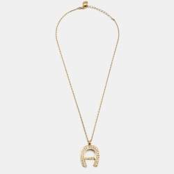 Aigner Crystal Embellished Logo Gold Tone Pendant Necklace 