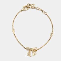 Aigner Bow Crystals Gold Tone Bracelet