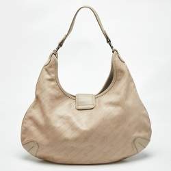 Pre Owned Aigner Light Beige Logo Embossed Leather Charm Hobo