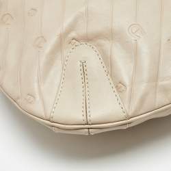 Pre Owned Aigner Light Beige Logo Embossed Leather Charm Hobo