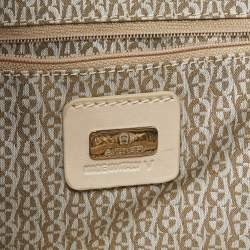 Pre Owned Aigner Light Beige Logo Embossed Leather Charm Hobo