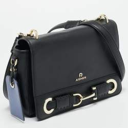 مملوكة مسبقًا حقيبة كتف أيغنر جلد قلاب أسود