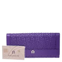 Pre Owned Aigner Purple Logo Embossed Leather Cavallina Tote