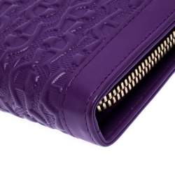 Pre Owned Aigner Purple Monogram Embossed Leather Cavallina Zip Around Wallet