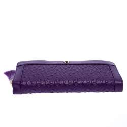 Pre Owned Aigner Purple Monogram Embossed Leather Cavallina Zip Around Wallet