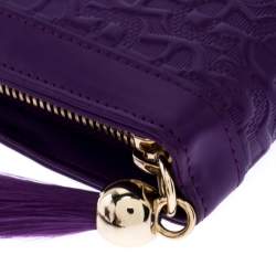 Pre Owned Aigner Purple Monogram Embossed Leather Cavallina Zip Around Wallet