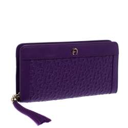 Pre Owned Aigner Purple Monogram Embossed Leather Cavallina Zip Around Wallet