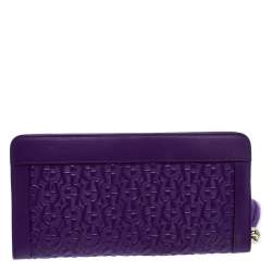 Pre Owned Aigner Purple Monogram Embossed Leather Cavallina Zip Around Wallet