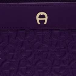 Pre Owned Aigner Purple Monogram Embossed Leather Cavallina Zip Around Wallet