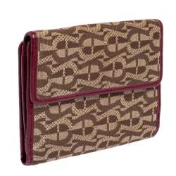 مملوكة مسبقًا محفظة أيغنر ثلاثية الطيه جلد و كانفاس بالشعار عنابي و بني 