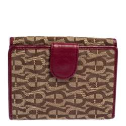 مملوكة مسبقًا محفظة أيغنر ثلاثية الطيه جلد و كانفاس بالشعار عنابي و بني 