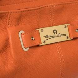 Pre Owned Aigner Orange Leather Logo Drawstring Hobo