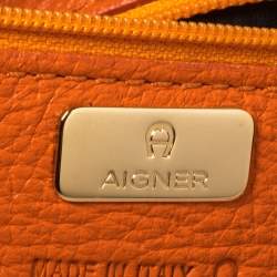 Pre Owned Aigner Orange Leather Logo Drawstring Hobo