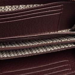 Pre Owned محفظة أيغنر جلد عنابي بسحاب محيط