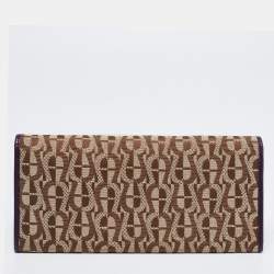 Pre Owned Aigner Beige/Purple Signature Canvas and Leather Flap Continental Wallet
