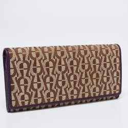 Pre Owned Aigner Beige/Purple Signature Canvas and Leather Flap Continental Wallet