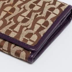 Pre Owned Aigner Beige/Purple Signature Canvas and Leather Flap Continental Wallet