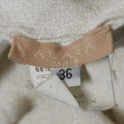 Pre Owned فستان علايا محبوك مزخرف أبيض بدون أكمام واسع بطول الركبة مقاس صغير - سمول