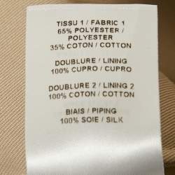 مملوكة مسبقًا فستان علايا ميني قبة رقبة بيج قماش جباردين مقاس صغير