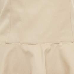 مملوكة مسبقًا فستان علايا ميني قبة رقبة بيج قماش جباردين مقاس صغير