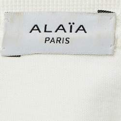 مملوكة مسبقًا تي شيرت مقاس وسط ألاءيا قطن أبيض بطبعة شعار زهور رقبة دائرية