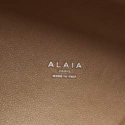 Pre Owned حقيبة يد علايا لو مينا سويدي بني بقاعدة ليزر ٢٥