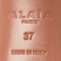 Pre Owned مذوق علياء لو كور جلد لامع أبيض/شفاف بي في سي مقاس 37