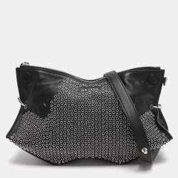 مملوكة مسبقًا Alexander McQueen De Manta Eyelets Black Leather Clutch