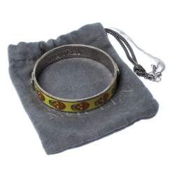 Pre Owned Alexander McQueen Yellow Resin Skull Enamel Silver Tone Bangle Bracelet