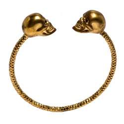 Pre Owned Alexander McQueen Crystal Twin Skull Textured Gold Tone Open Cuff Bracelet 