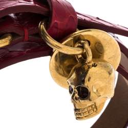 Pre Owned Alexander McQueen Snakeskin Leather Gold Tone Skull Charm Wrap Bracelet
