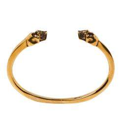 مملوكة مسبقًا Alexander McQueen Twin Skull Motif Gold Tone Open Cuff Bracelet
