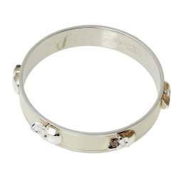 Pre Owned سوار أليكساندر ماكوين مزين جماجم ثلاثية الأبعاد معدن ذهبي اللون و إينامل كريمي