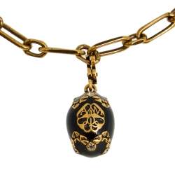 مملوكة مسبقًا Alexander McQueen Antique Gold Tone Chain Bracelet & Egg Charm Set