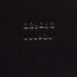 Pre Owned Alexander McQueen Black/Gold Leather Studded Four Ring Knuckle Clutch