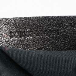 مملوكة مسبقًا Alexander McQueen Black Leather Medium Studded De Manta Clutch