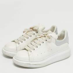 مملوكة مسبقًا حذاء رياضي ألكسندر ماكوين جلدي أبيض/وردي سويدي لاري مقاس 35