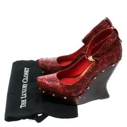 Pre Owned Alexander McQueen Red Embossed Snakeskin Leather Ankle Strap Spike Studded Wedge Pumps Size 39