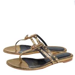 Pre Owned Alexander McQueen Metallic Gold Leather Embellished Skull Thong Flat Sandals Size 37.5
