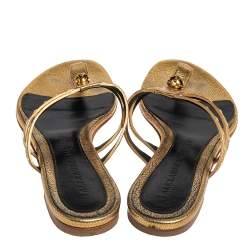 Pre Owned Alexander McQueen Metallic Gold Leather Embellished Skull Flat Thong Sandals Size 38