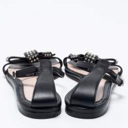 Pre Owned Alexander McQueen Black Leather Eyelet Embellished Bow Flat Ankle Strap Sandals Size 40