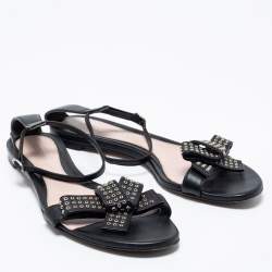 Pre Owned Alexander McQueen Black Leather Eyelet Embellished Bow Flat Ankle Strap Sandals Size 40