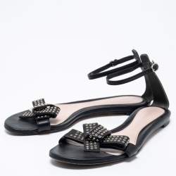 Pre Owned Alexander McQueen Black Leather Eyelet Embellished Bow Flat Ankle Strap Sandals Size 40