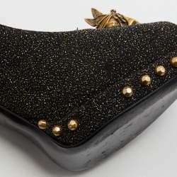 Pre Owned Alexander McQueen Black/Gold Textured Suede Embellished Skull Peep Toe Pumps Size 39.5