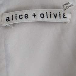 Pre Owned توب آليس + أوليفيا ليلا أسود مورد قصات ليزر بلا أكمام S