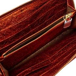 Pre Owned Anya Hindmarch Metallic Orange Textured Embossed Leather Zip Around Wallet