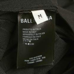 Pre Owned Balenciaga Black All-Over Logo Print Knit Pleated Midi Skirt M