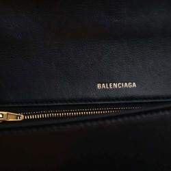 مملوكة مسبقًا حقيبة يد علوية بالنسياجا سوداء جلد عجل ناعم متوسطة الحجم هورجلاس