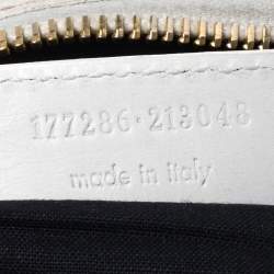 مملوكة مسبقًا حقيبة كلتش بالنسياغا جاينت غولد فلات جلد خروف أبيض